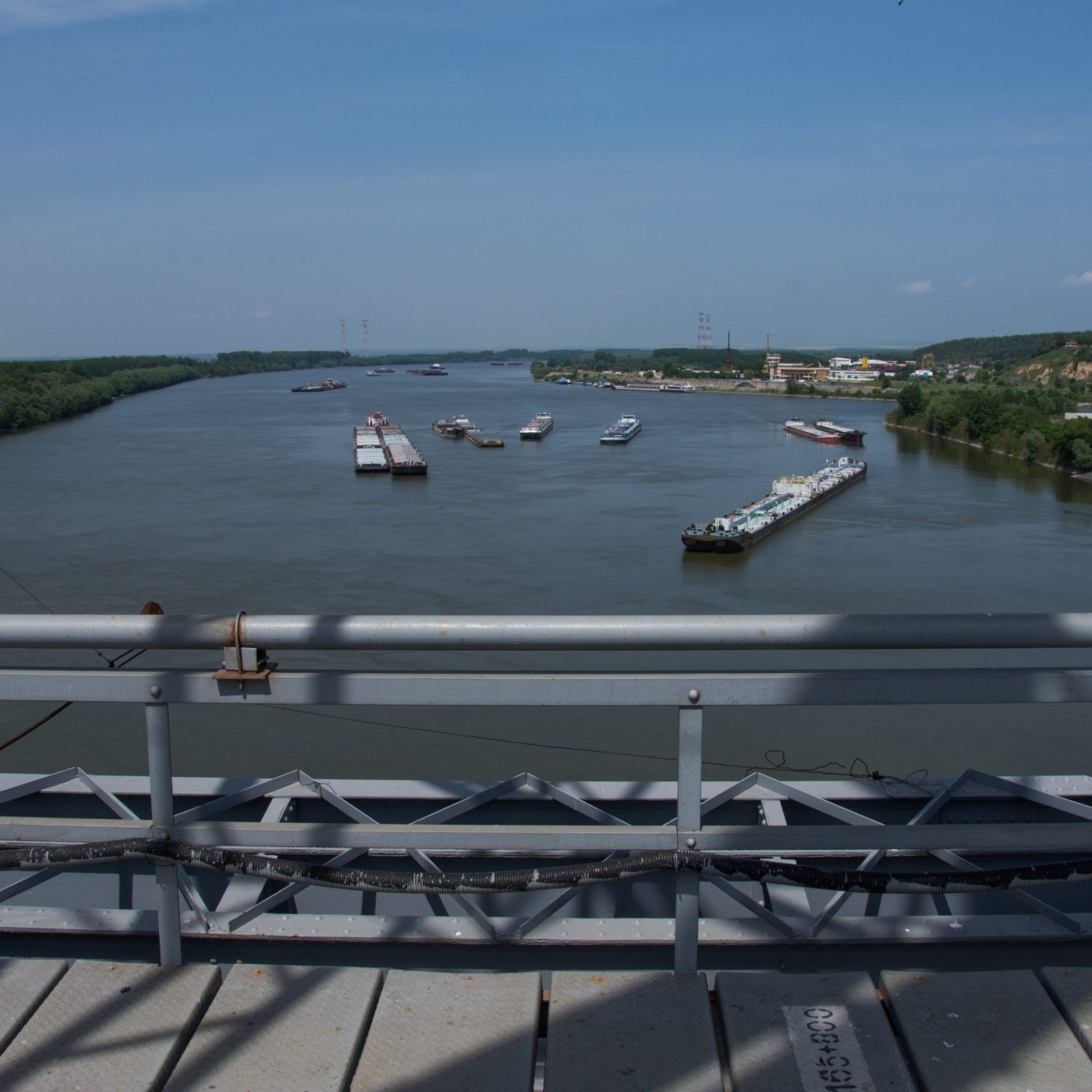 view  from The Anghel Saligny Bridge,
ships, barges on the Danube,Cernavoda, Romania. may , 2017