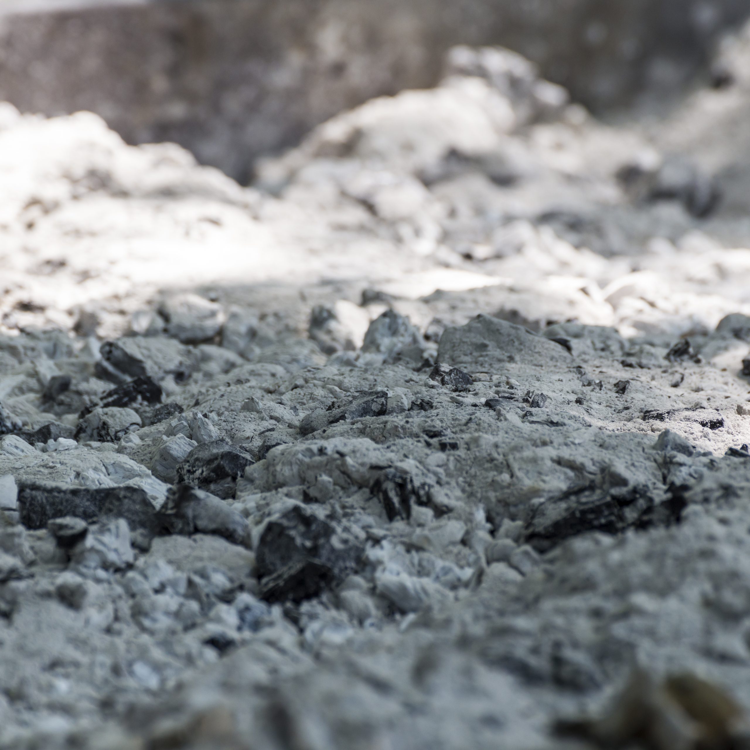 Close-up of a big pile of burnt charcoal ash