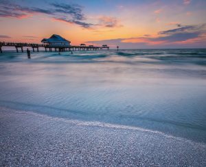 Sun setting over a vibrant horizon in the Clearwater beach, Florida
