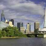 Winnipeg, Manitoba, Canada- August 9, 2023: Winnipeg skyline from across the Red River