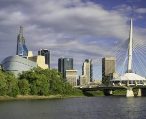 Winnipeg, Manitoba, Canada- August 9, 2023: Winnipeg skyline from across the Red River